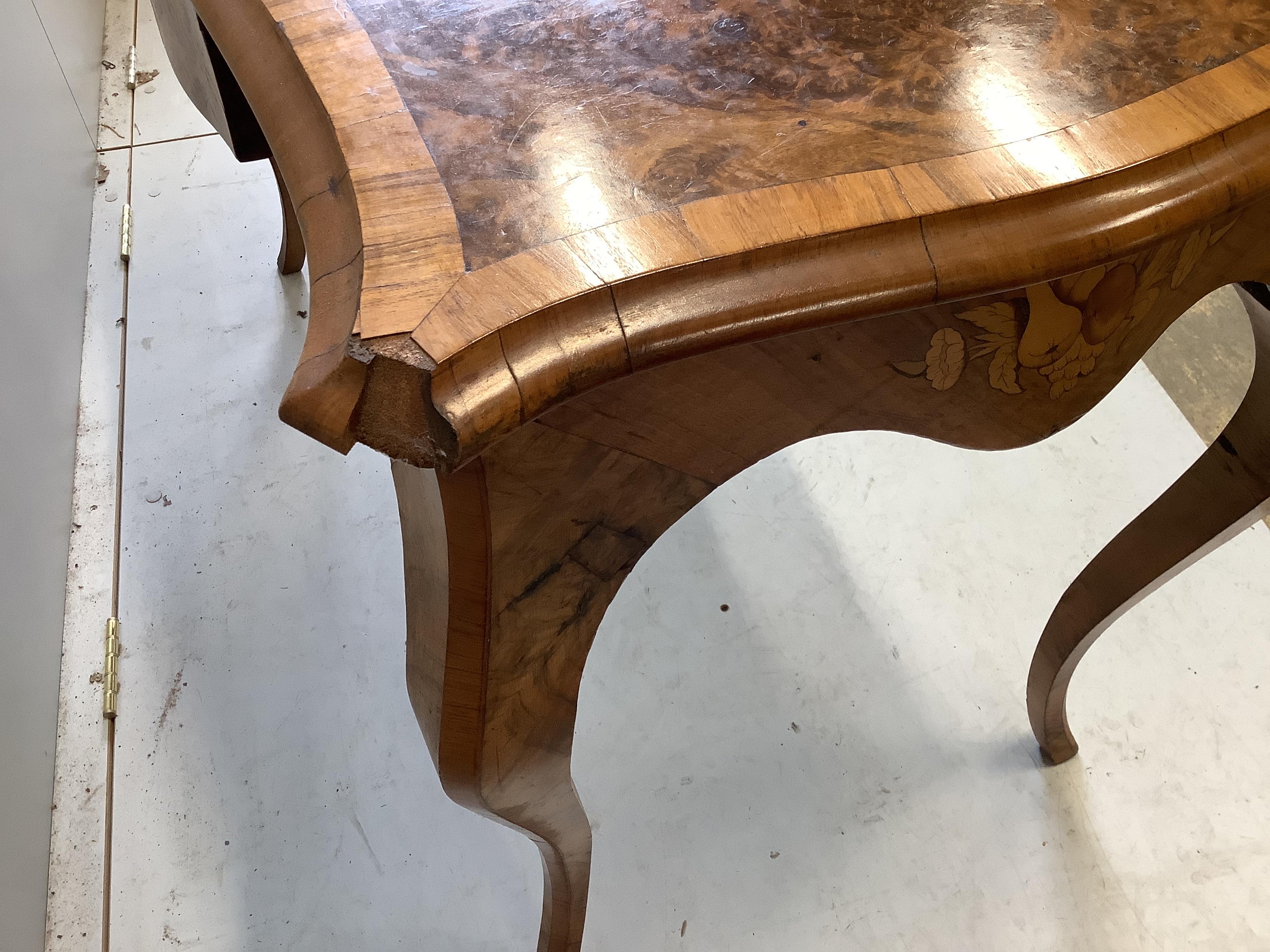 A Victorian marquetry inlaid burr walnut serpentine table, width 104cm, depth 60cm, height 73cm
